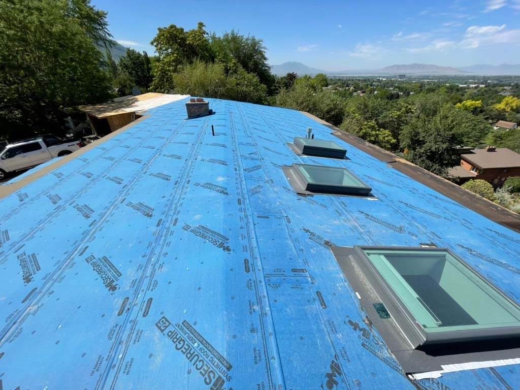 Lower Slope Re-roof with Custom Black Membrane